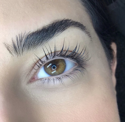 A photo of a client's lashes after undergoing our professional lash lift and tint service at Wilde Beauty Co. in San Diego, showcasing the lifted and curled look of the lashes and the added definition and depth from the tint.