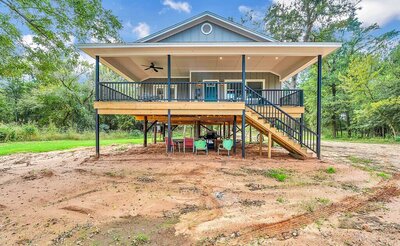 Large deck overlooking the Brazos River at this 2 bedroom 2 bath bungalow near downtown Waco, TX