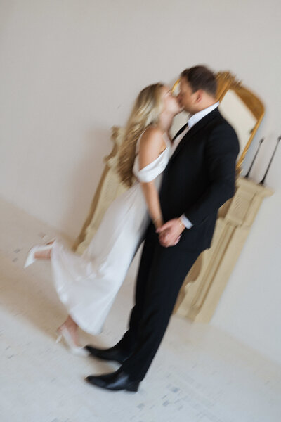 bride and groom share a look after their Charleston ceremony
