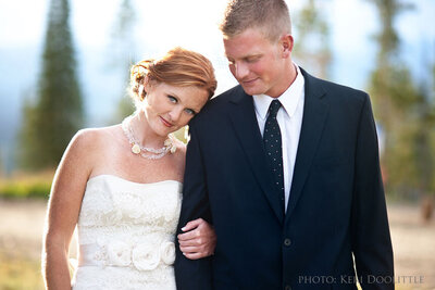 red head bride and groom in winter park colorado