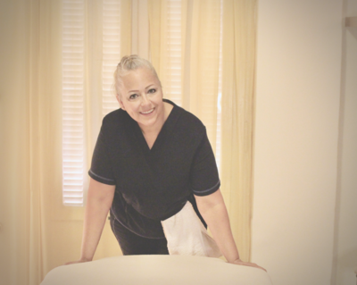 educated and licensed massage therapist ready to welcome her clients