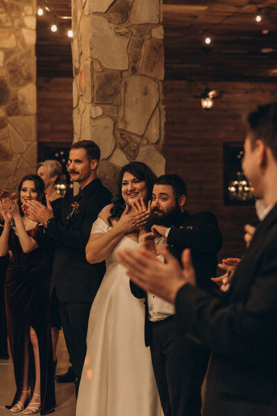 Bride and groom on wedding day  at their reception at Magnolia Bells in  Texas