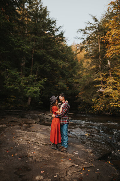 couple standing in river
