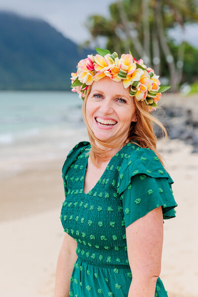 This is a picture of the photographer on a beach in Hawaii. She looks so happy and fun to be around.