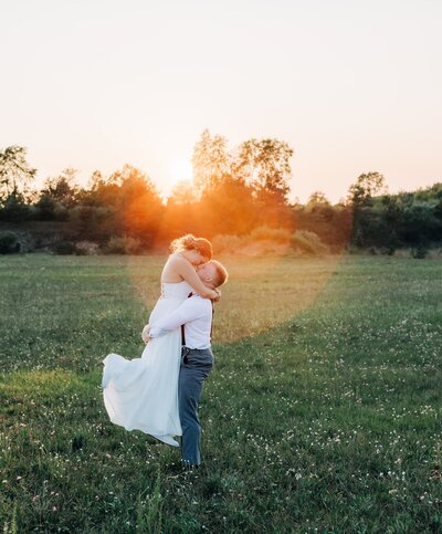 Newlywed couple embracing after getting married