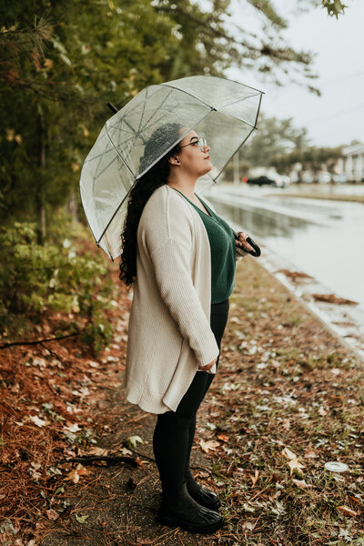 woman under clear umbrella