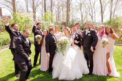 A bride holds her bouquet from Flor De Casa at Big Cork Vineyards