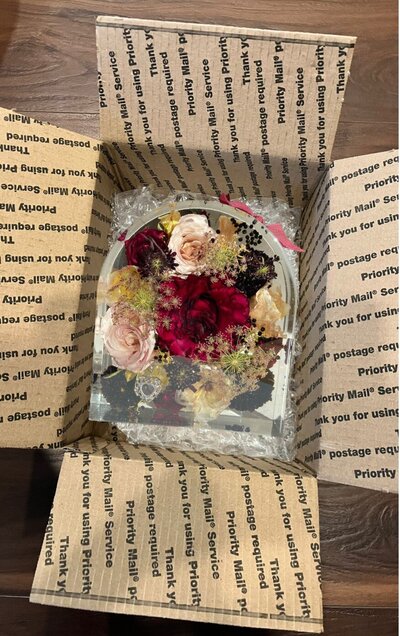 side arrangement funeral flowers at White Pine funeral Home