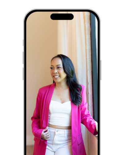 Creative headshots of a Dallas brand photographer dressed in a pink t-shirt, holding her professional camera and surrounded by tools of her trade in a studio setting.