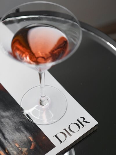 Cosmo cocktail on a Dior catalog