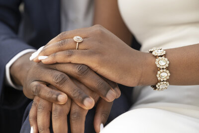 a wedding ring on a womans hand