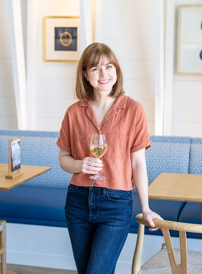 Stephanie Faires holding a wine glass