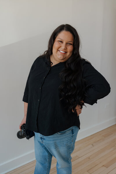 A portrait of a wedding photographer in a studio. 