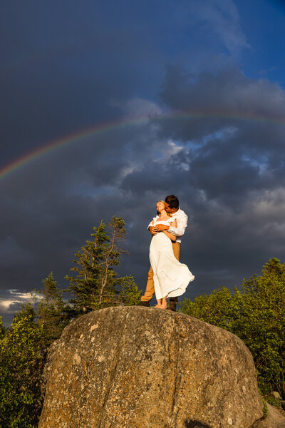 couple kissing in Yosemite taken by Minnesota wedding photographer Marcus Hanenburg Photography