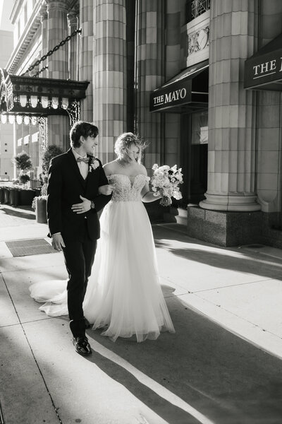 an engaged couple embracing