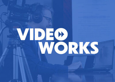 Videoworks Brand Identity Creation White Logo on a Blue Faded Background Image