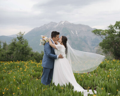 bride holding bridal bouquet and smiling