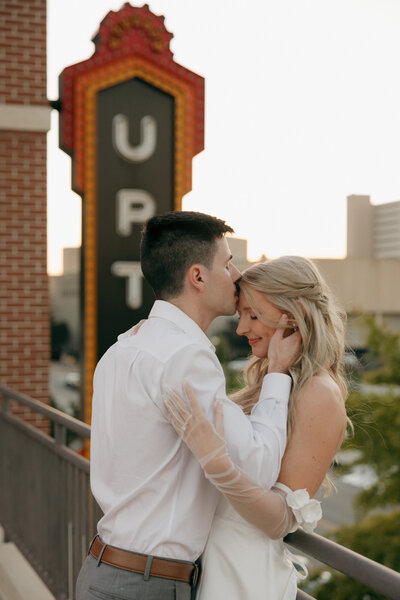 Birmingham engagement photographer captures couple in western outfits on their land in Birmingham AL