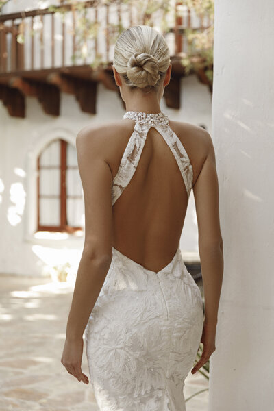 bride with hand on her shoulder