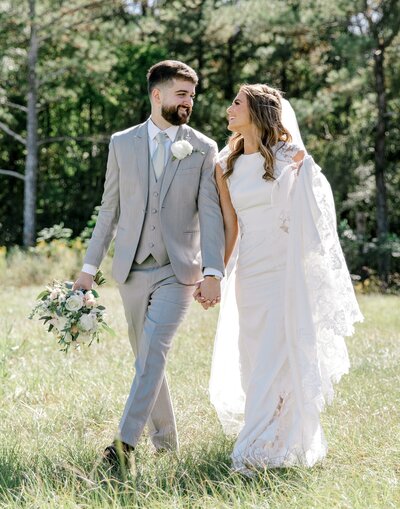Bride and groom walk up memorial steps at their DC wedding