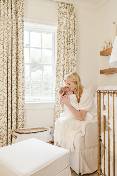 Mother kissing newborn -Newborn Photography Greenville SC