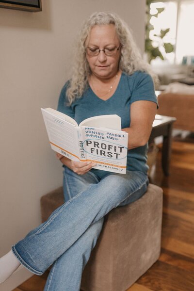 Michelle Krieger Dragonfly Ventures owner & Profit First Bookkeeper reading profit first