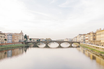 landscape picture of bridge in Florence, Italy at golden hour