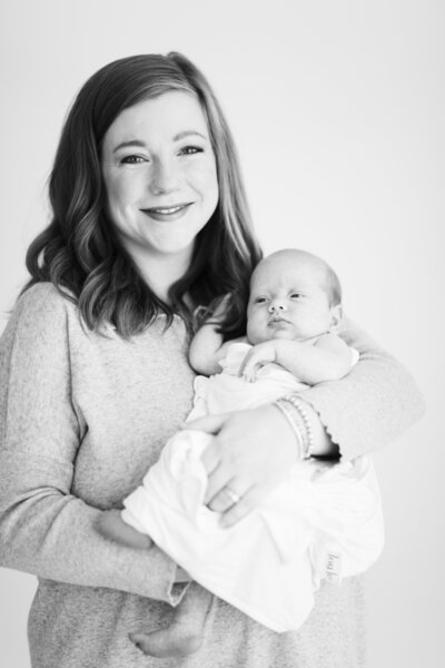 Caroline Eidson with newborn baby balancing work and home life 