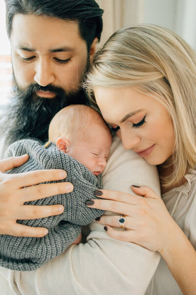 In-home and studio lifestyle newborn photoshoot