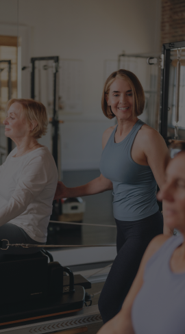 woman teaching a pilates class 
