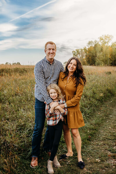outdoor fall family portrait during sunset near eau claire wi