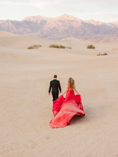 Couple Walking Away in Desert