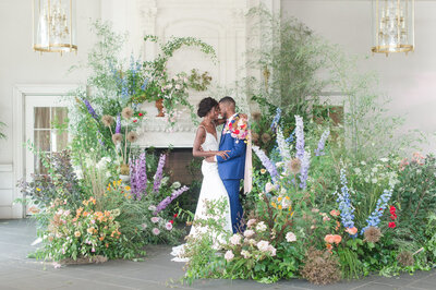 Spring floral Park Chateau Wedding by fireplace