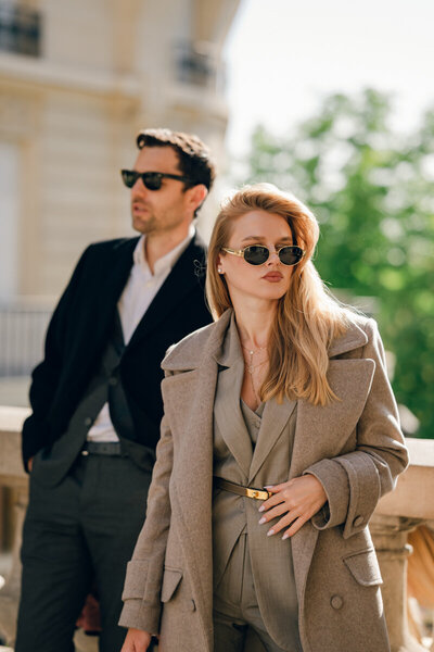 man and woman standing next to each other