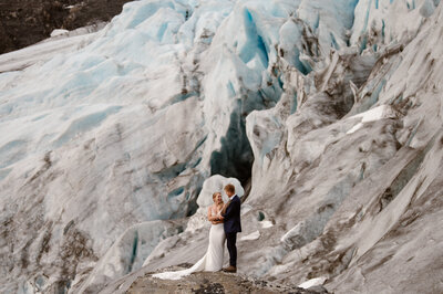 Bride & Groom in front of Alaskan glacier on their PNW elopement
