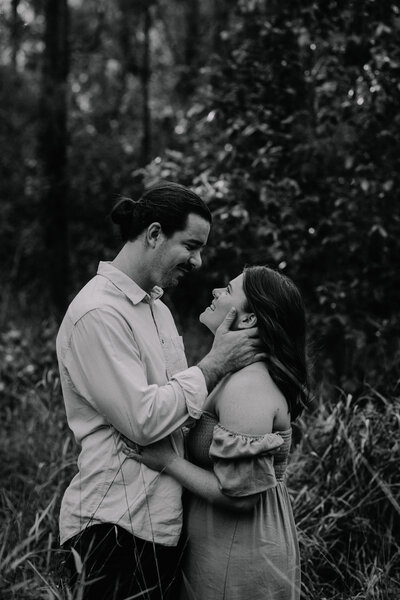 Brisbane engagement photograph, sunset photo of couple in field.