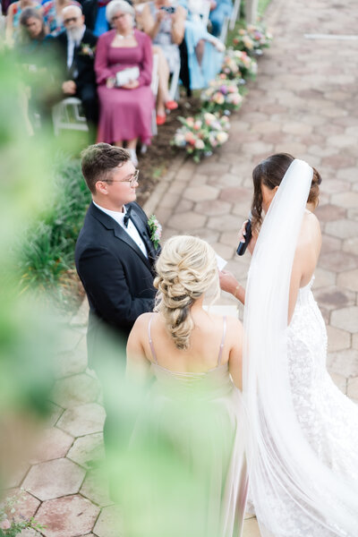 A bride and groom exchanging their vows at a Florida wedding venue Epping Forest Yacht Club