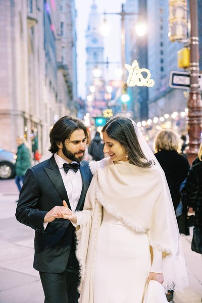 Bride and groom downtown