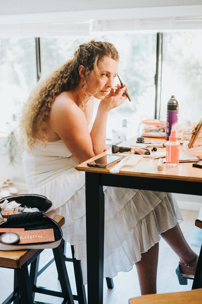 Portrait of Founder, Nichole Collins — creative, intuitive, and not afraid of the wild.
