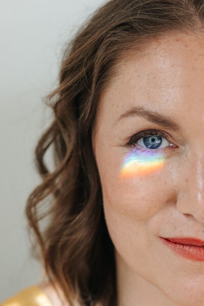 elizabeth with rainbow reflection under eye