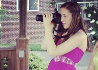 Katie Fri in a prom dress, capturing moments