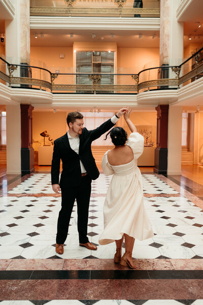baltimore couple holding engagement ring