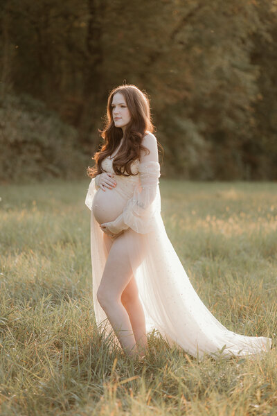 maternity pose in golden hour sunlight in Lehigh Valley PA.