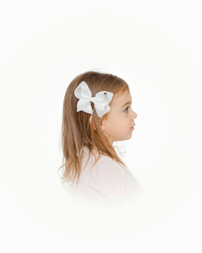 girl’s right profile during heirloom photos in Loudoun County, Virginia
