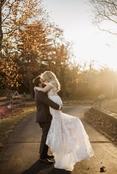 couple hugging under tree