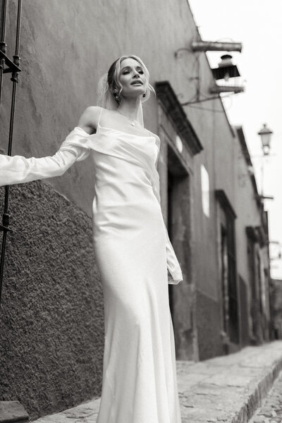 editorial bride standing in the street