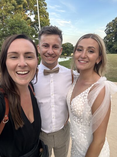 Amy & Nick posing with couple