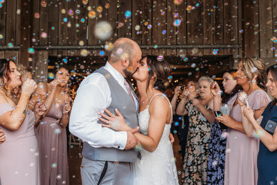 groom dipping bride