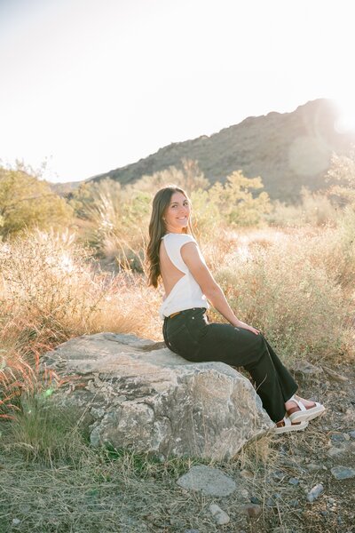 Senior girl posing for graduation portrait in north scottsdale