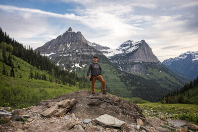 guy standing in the mountains taken by Iceland elopement photographer Marcus Hanenburg Photography